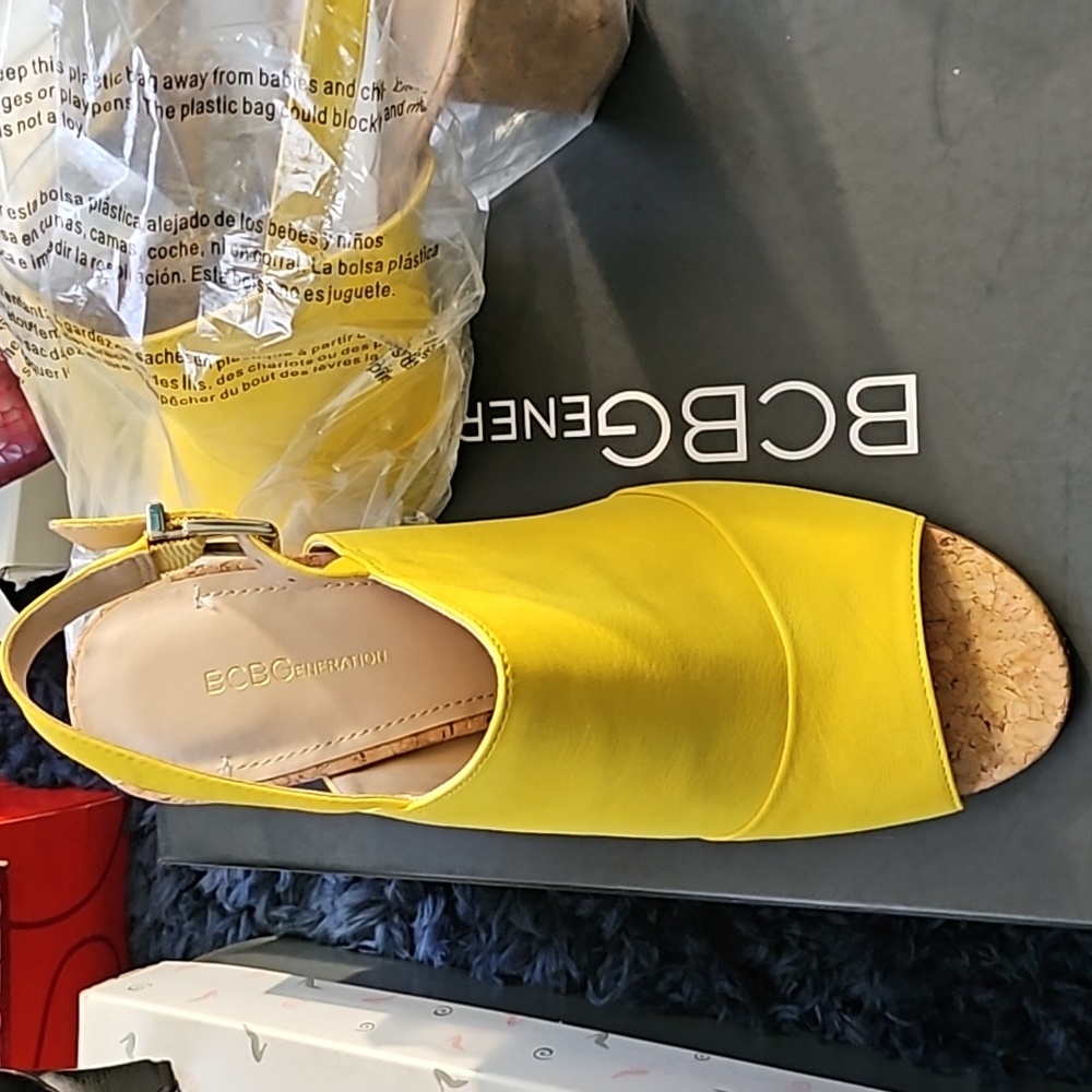 A yellow cut out b c b shoe